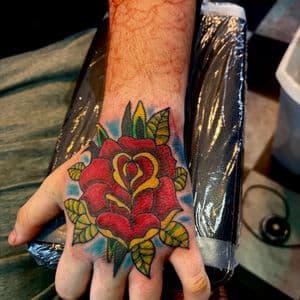Traditional + American Traditional rose tattoo on Hand by Meaney_Tattoos_06 on TattMe