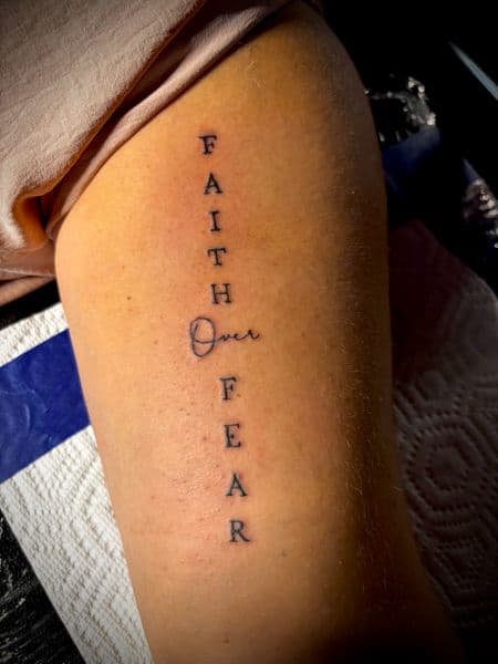 Lettering + Script faith tattoo on Upper Arm by Murda_Innk on TattMe