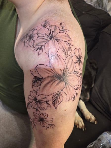 Floral + Line-work flowers tattoo on Upper Arm by Certified__OB on TattMe
