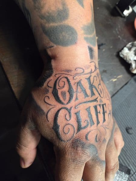 Lettering + Script oak cliff tattoo on Hand by Certified__OB on TattMe