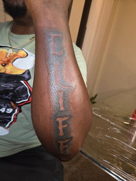 Lettering + Black & Grey cliff tattoo on Forearm by Certified__OB on TattMe