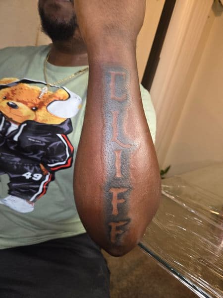 Lettering + Color lettering tattoo on Forearm by Certified__OB on TattMe