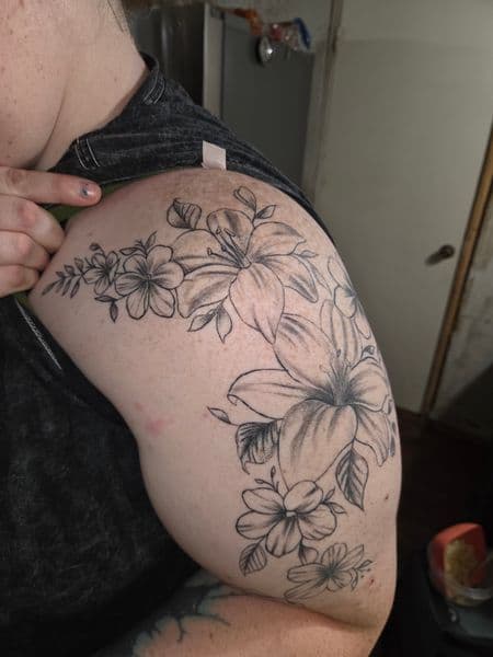 Floral + Illustrative flowers tattoo on Upper Arm by Certified__OB on TattMe