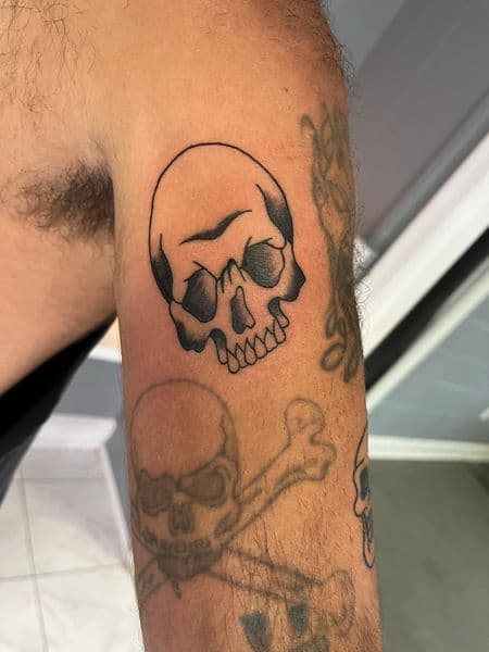 Traditional + Black-work skull tattoo on Upper Arm by inksfromkels on TattMe
