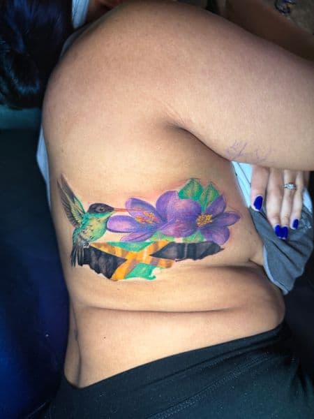Color + Realism hummingbird tattoo on Ribs by nayasTats on TattMe