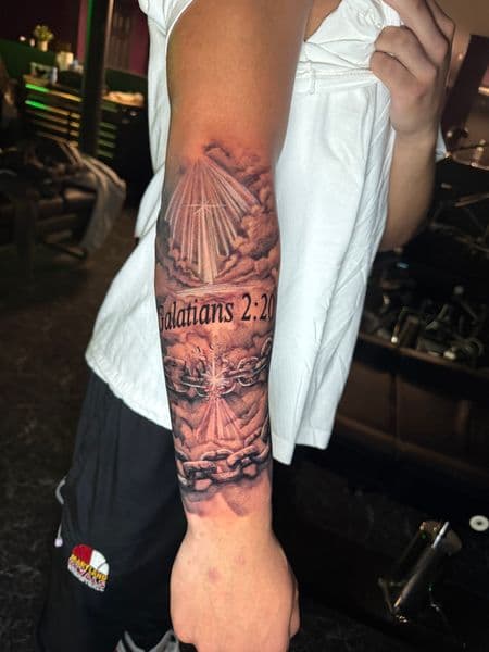 Black & Grey + Lettering cross tattoo on Forearm by nayasTats on TattMe