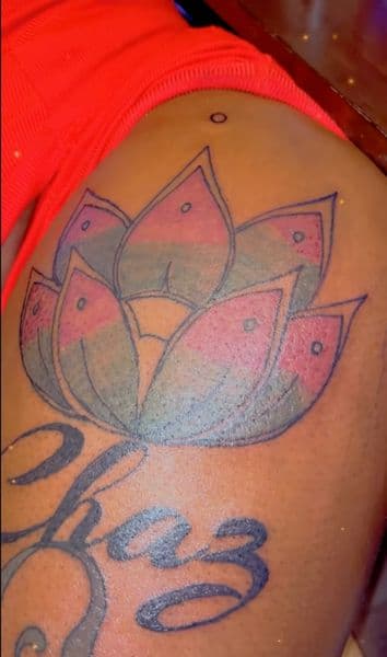 Lettering + Floral lotus tattoo on Thigh by TattsByNaee on TattMe