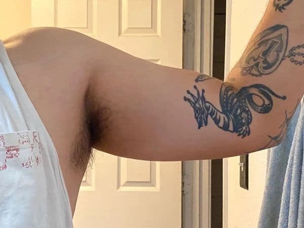 Black-work + Illustrative slug tattoo on Upper Arm by tenderhearttat1 on TattMe