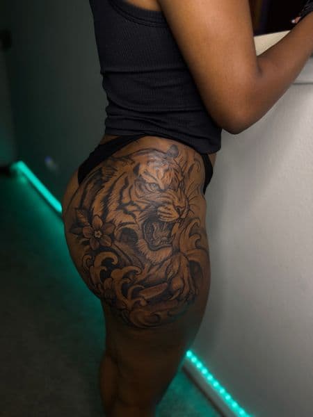 Black & Grey + Illustrative tiger tattoo on Hip by Juanyane on TattMe