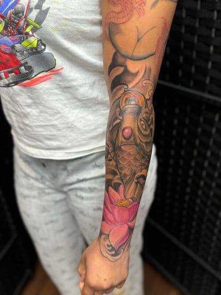 Japanese + Color koi fish tattoo on Half Sleeve by Juanyane on TattMe