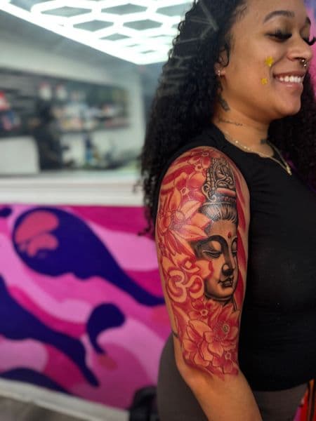 Black & Grey + Color buddha tattoo on Upper Arm by Juanyane on TattMe