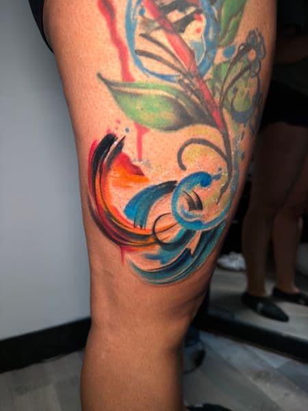 Watercolor + Color colors tattoo on Thigh by ARTWORLDINK on TattMe