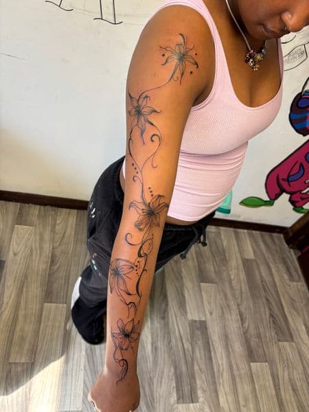 Fine Line + Floral flowers tattoo on Full Sleeve by TatsByDaVinci on TattMe