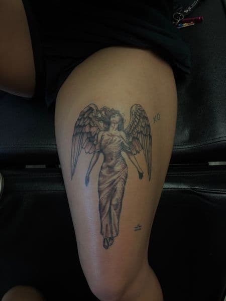 Black & Grey + Illustrative angel tattoo on Thigh by TatsByDaVinci on TattMe