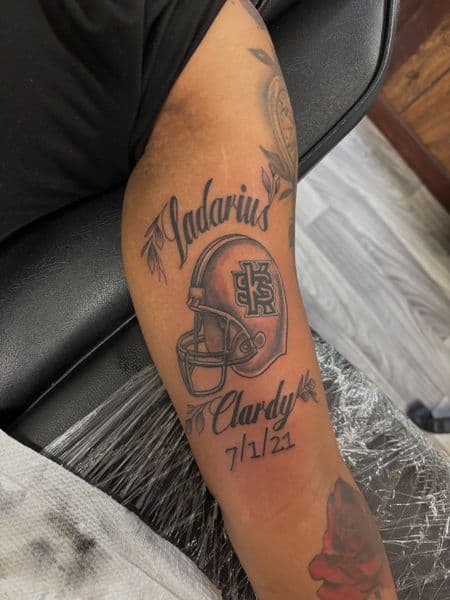 Black & Grey + Lettering helmet tattoo on Forearm by TatsByDaVinci on TattMe
