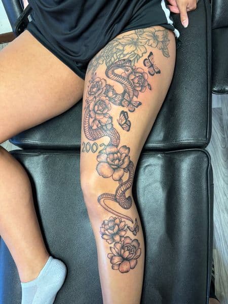 Fine Line + Black & Grey snake tattoo on Thigh by TatsByDaVinci on TattMe