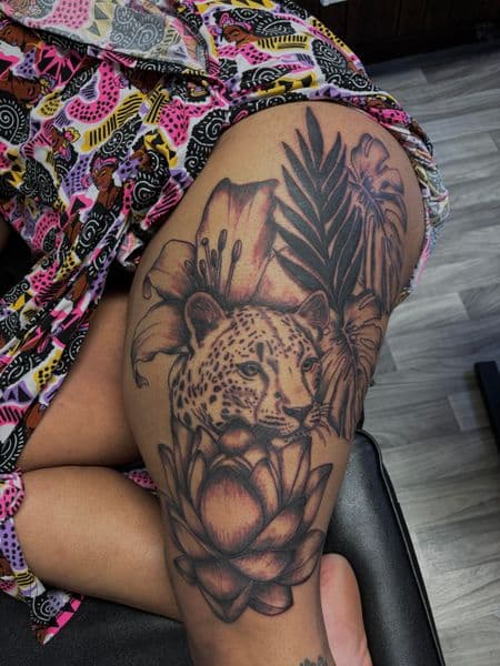 Black & Grey + Illustrative leopard tattoo on Thigh by TatsByDaVinci on TattMe