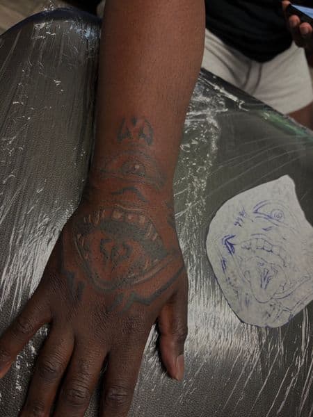Black-work + Illustrative monster tattoo on Hand by TatsByDaVinci on TattMe
