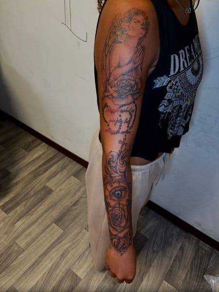 Black & Grey + Realism angel tattoo on Full Sleeve by TatsByDaVinci on TattMe