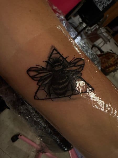 Black & Grey + Geometric bee tattoo on Forearm by erika.main.ave on TattMe