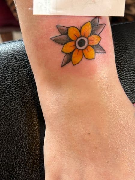 Traditional + Color flower tattoo on Wrist by erika.main.ave on TattMe