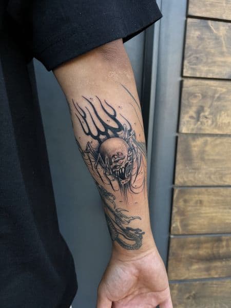 Black & Grey + Illustrative skull tattoo on Forearm by inkryptd on TattMe
