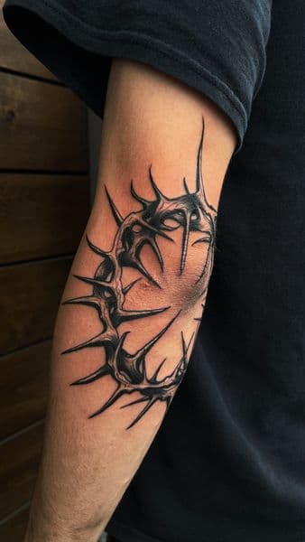 Black & Grey + Illustrative thorns tattoo on Elbow by inkryptd on TattMe