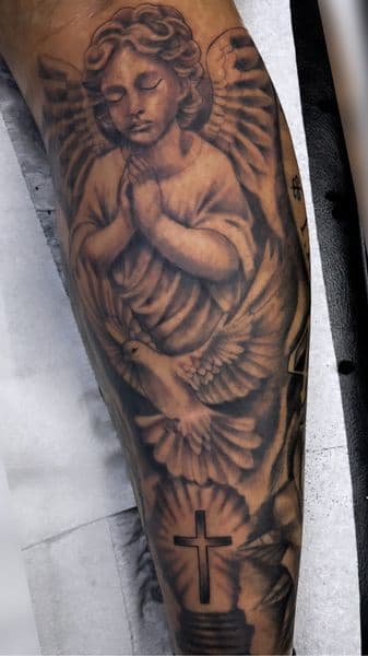 Black & Grey + Realism angel tattoo on Calf by without.a.trece on TattMe
