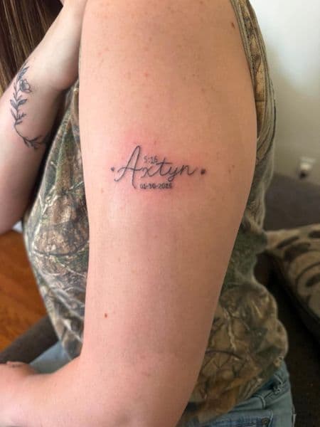 Fine Line + Lettering name tattoo on Upper Arm by TattzByWolf on TattMe