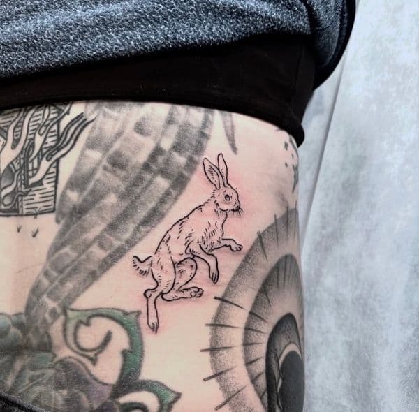 Line-work + Black-work rabbit tattoo on Ribs by RonGar on TattMe