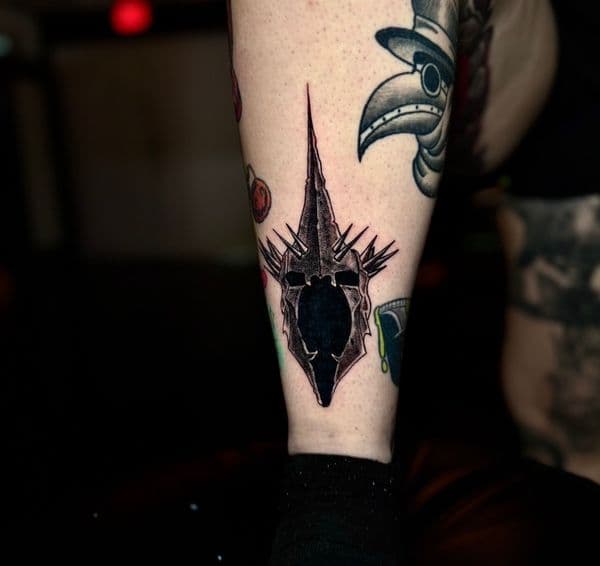 Traditional + Black-work helmet tattoo on Calf by RonGar on TattMe