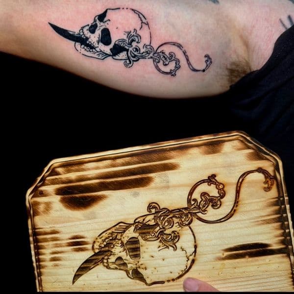 Black-work + Fine Line skull tattoo on Upper Arm by RonGar on TattMe
