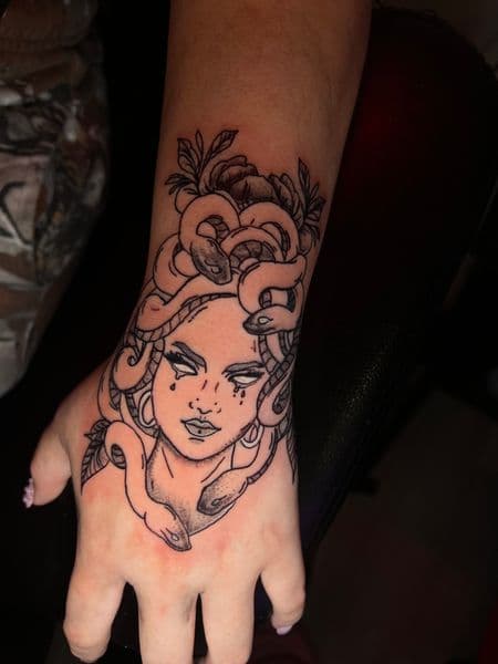 Illustrative + Black-work medusa tattoo on Hand by jules.inkz on TattMe