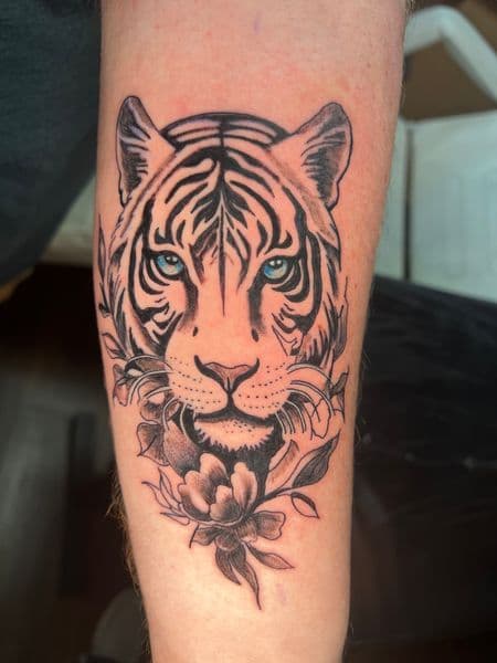 Black & Grey + Illustrative tiger tattoo on Forearm by jules.inkz on TattMe