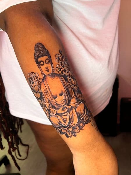 Black & Grey + Illustrative buddha tattoo on Forearm by jules.inkz on TattMe