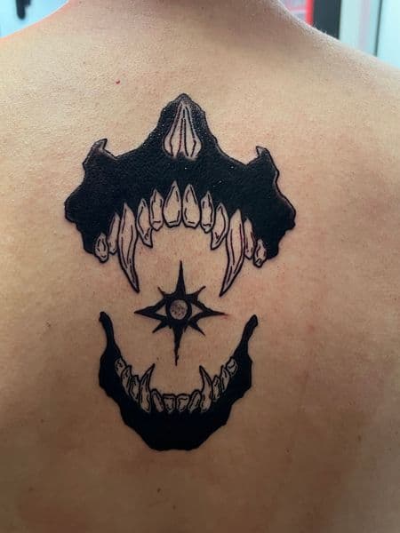 Black-work + Illustrative skull tattoo on Upper Back by jules.inkz on TattMe