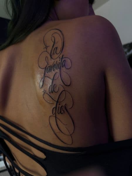 Lettering + Script lettering tattoo on Upper Back by 719sFineLinez on TattMe