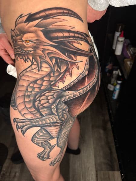 Black & Grey + Illustrative dragon tattoo on Thigh by rich_inkq on TattMe