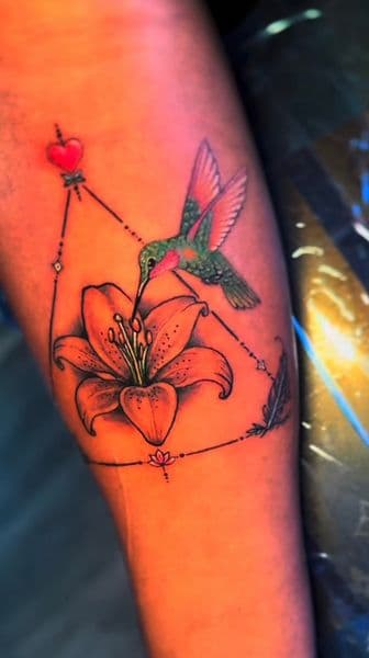 Color + Illustrative hummingbird tattoo on Forearm by rich_inkq on TattMe