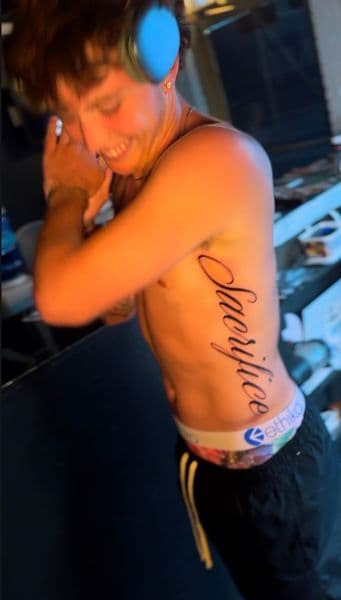 Script + Lettering sacrifice tattoo on Ribs by rich_inkq on TattMe