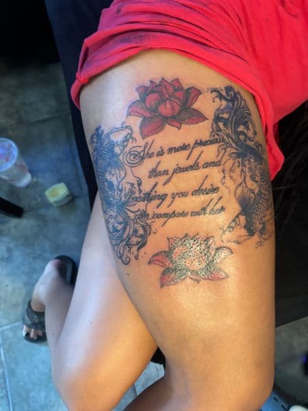 Floral + Lettering flowers tattoo on Thigh by gunna_tartoos_ on TattMe