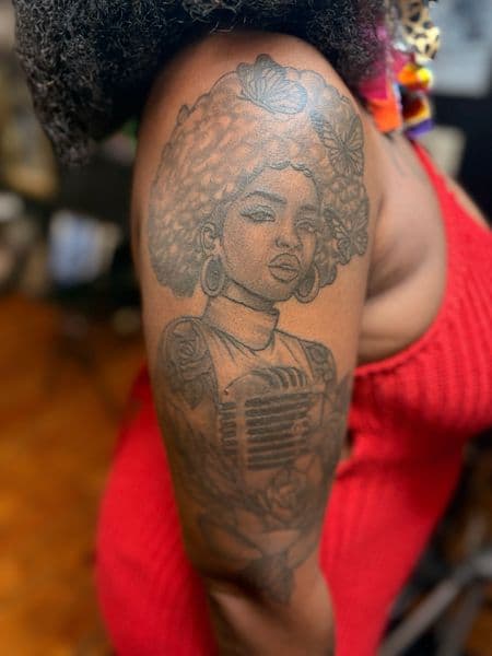Black & Grey + Illustrative woman tattoo on Upper Arm by Tony_Hustle_215 on TattMe