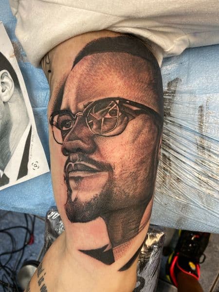 Realism + Black & Grey portrait tattoo on Upper Arm by Tony_Hustle_215 on TattMe