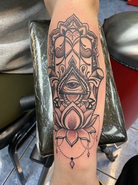 Black & Grey + Dot-work hamsa hand tattoo on Forearm by Tony_Hustle_215 on TattMe