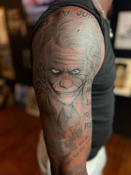 Realism + Black & Grey joker tattoo on Upper Arm by Tony_Hustle_215 on TattMe