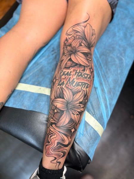 Black & Grey + Illustrative flowers tattoo on Calf by Tony_Hustle_215 on TattMe
