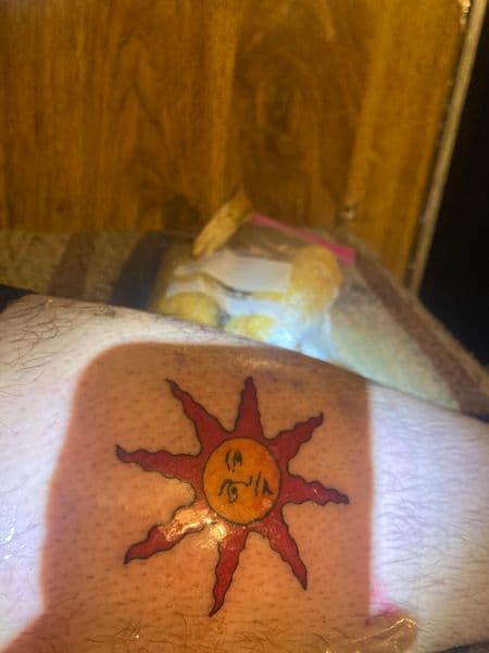 Color + Pop Culture sun tattoo on Calf by CodyWithTatForge on TattMe