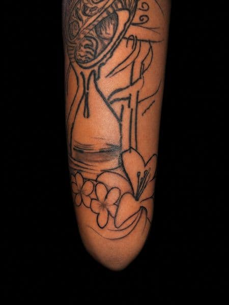 Line-work + Floral hourglass tattoo on Elbow by tat_2_guroo on TattMe