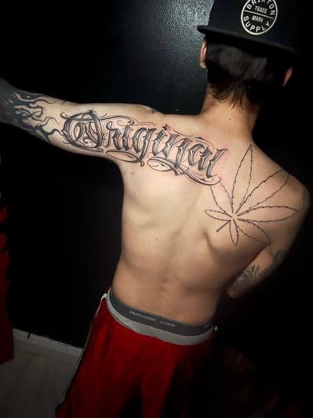Lettering + Script lettering tattoo on Upper Back by TattooHut on TattMe