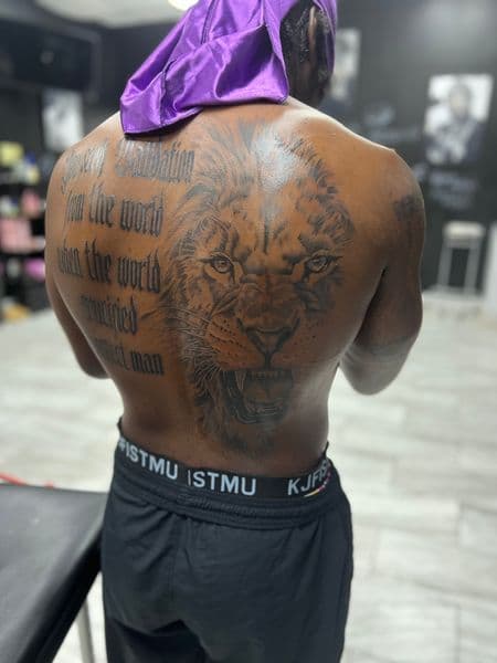 Black & Grey + Realism lion tattoo on Upper Back by TattooHut on TattMe